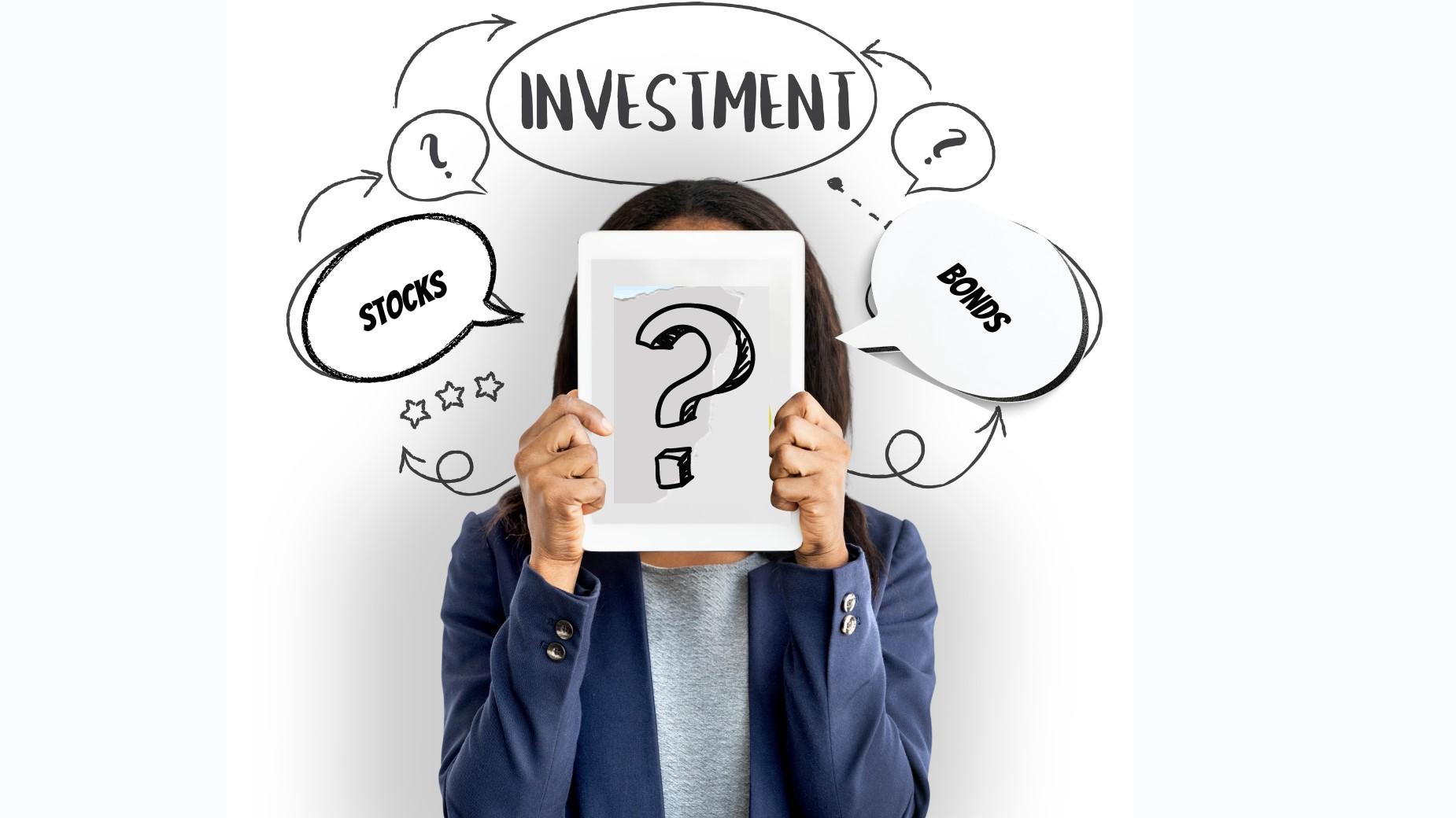woman holding a paper with a question mark