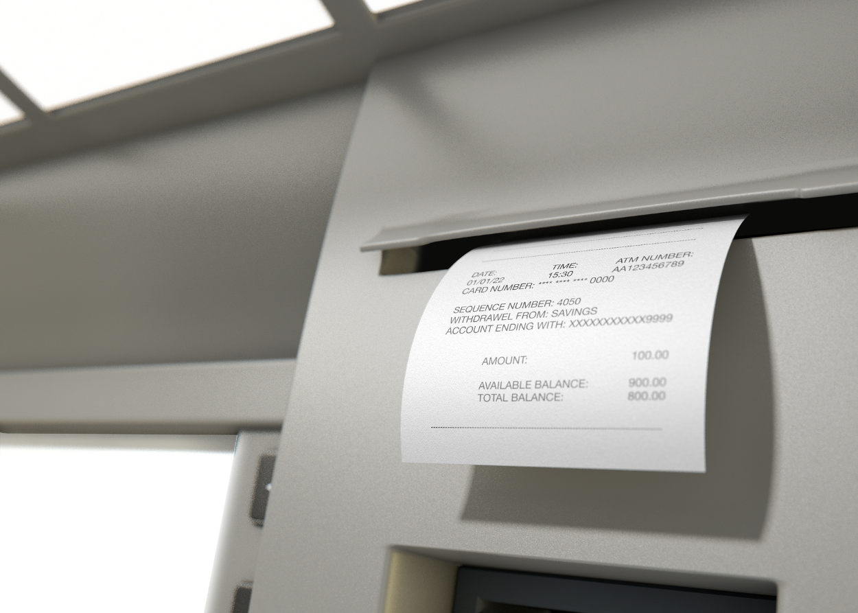 A withdrawal receipt coming out of an ATM